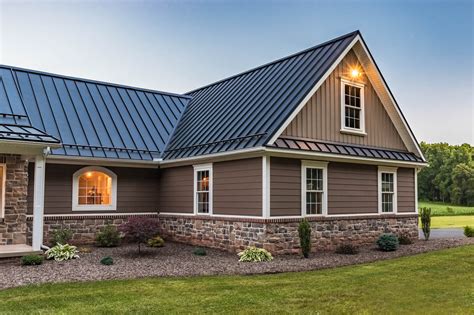 metal roof on brown house|gray houses with brown roofs.